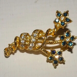 Vintage Roman Floral Rhinestone Brooch Pin silver plated with crystals.